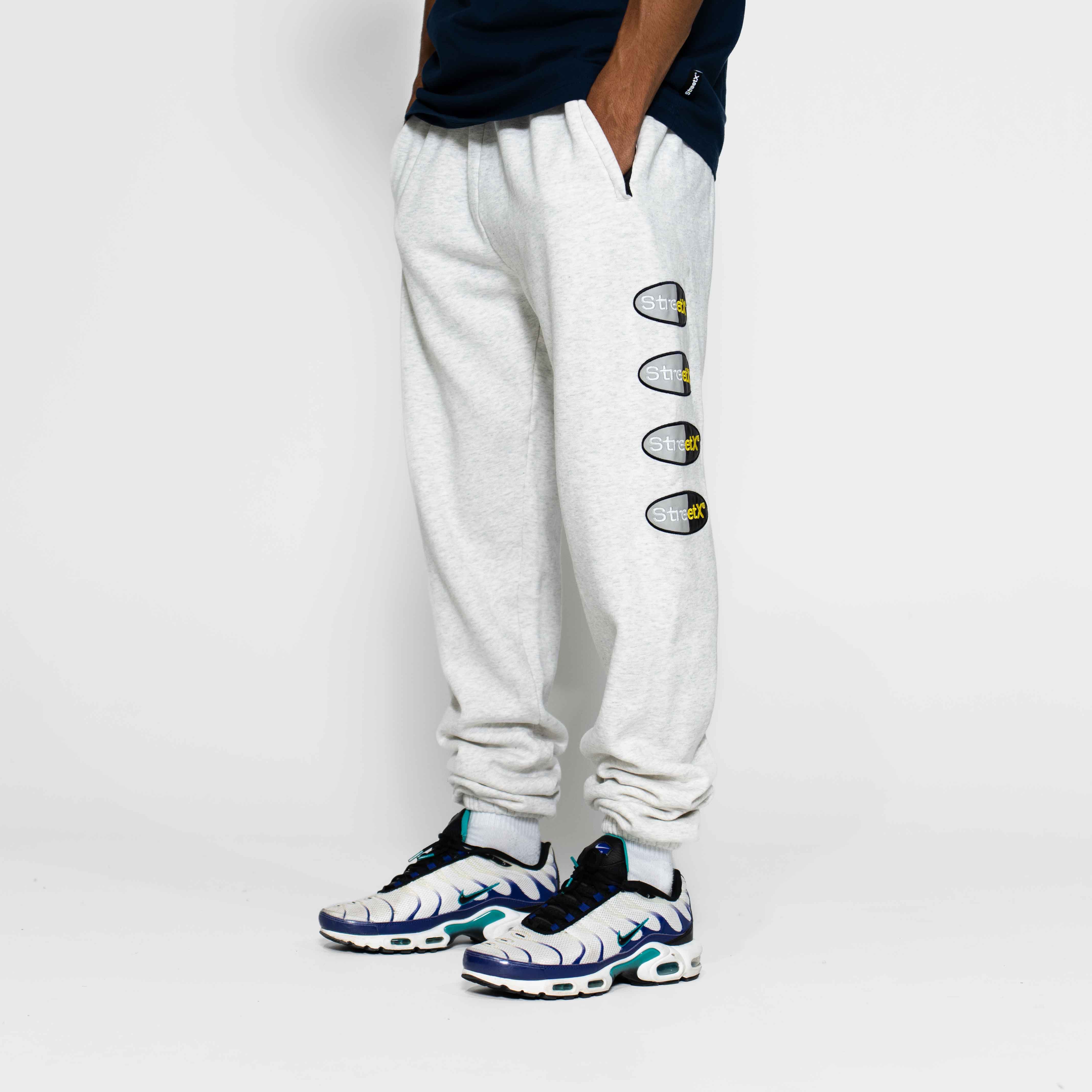 Split Oval Wordmark Track Pants - Image 8